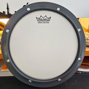 Remo 8" drummer's tunable practice pad in box, w/Syncopation by Ted Reed